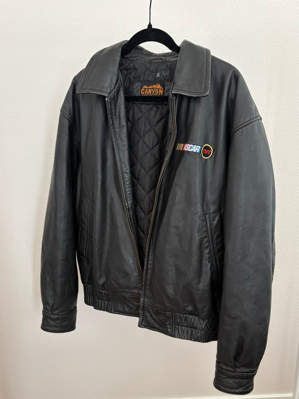 Men’s vintage NASCAR TNT leather jacket fits like a men’s medium